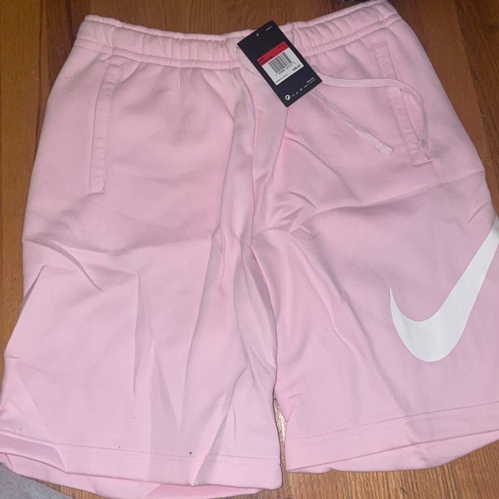 Pink Nike men’s sweat shorts